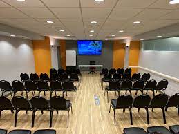 alt = "a seminar room with state of art technology"