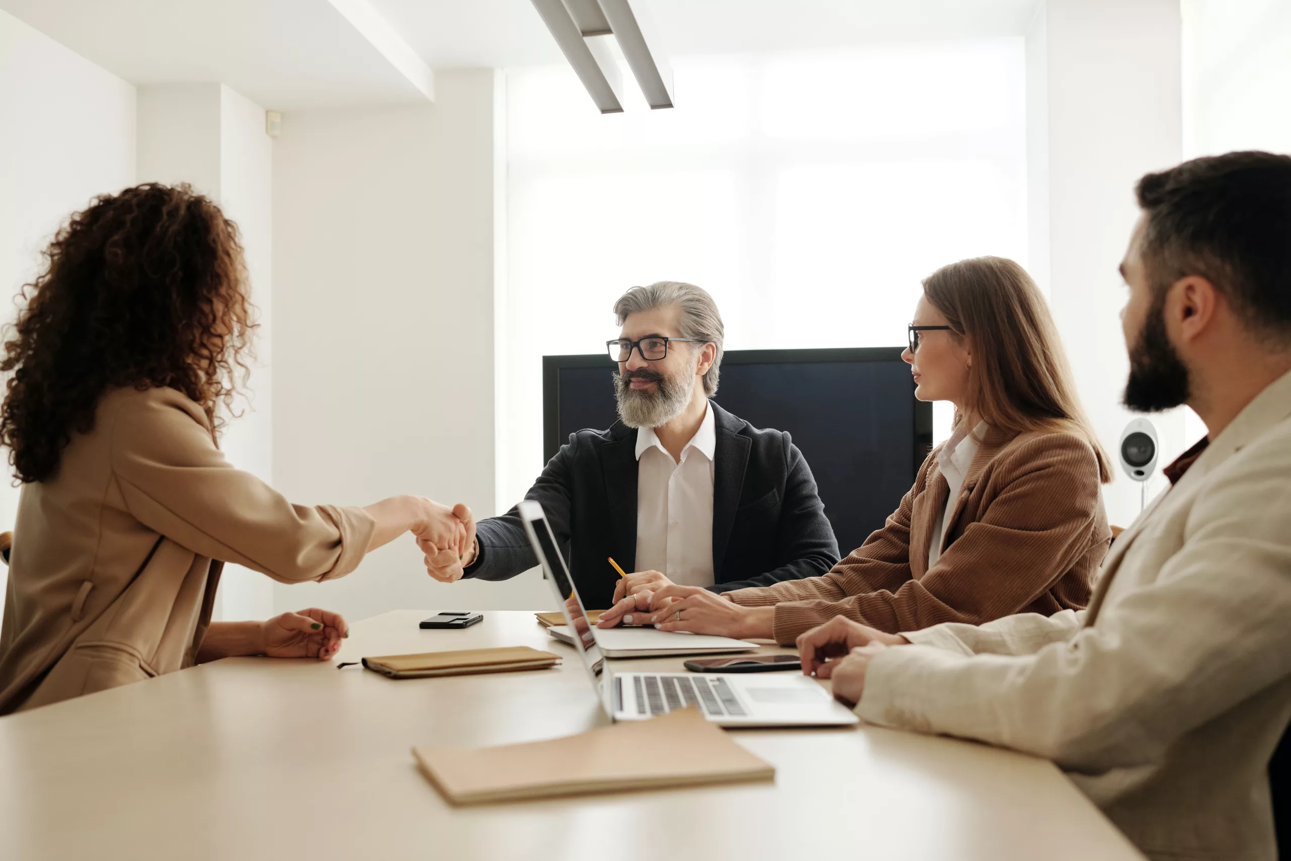 alt = "human resources generalist interviewing a candidate"